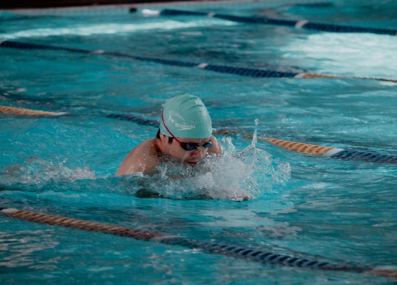 Open water swimmer in wetsuit